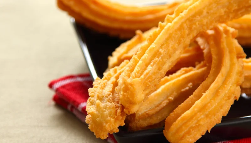 Churros de pommes de terre à la raclette