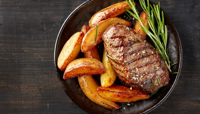 Sauté de pommes de terre et magrets de canard