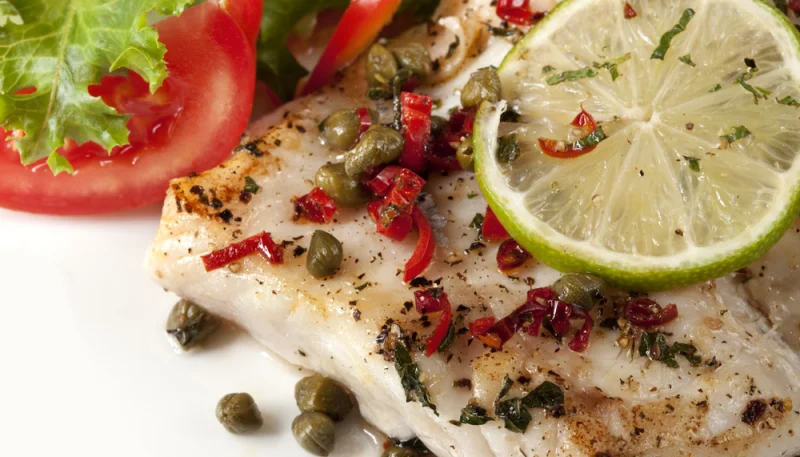 Papillotes de poisson au citron et aux câpres