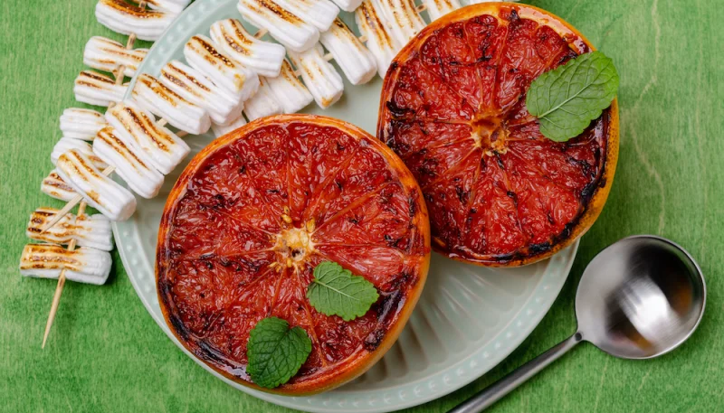 Pomelos rôtis au thym, miel et huile d'olive