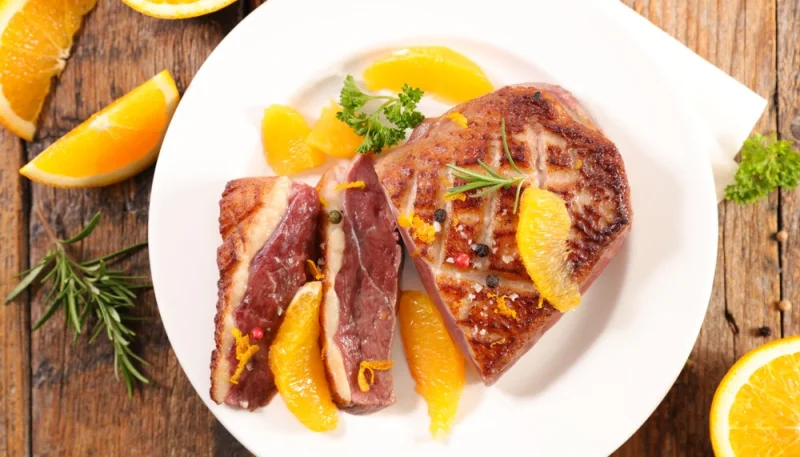 Magret de canard flambé à l'orange et au citron