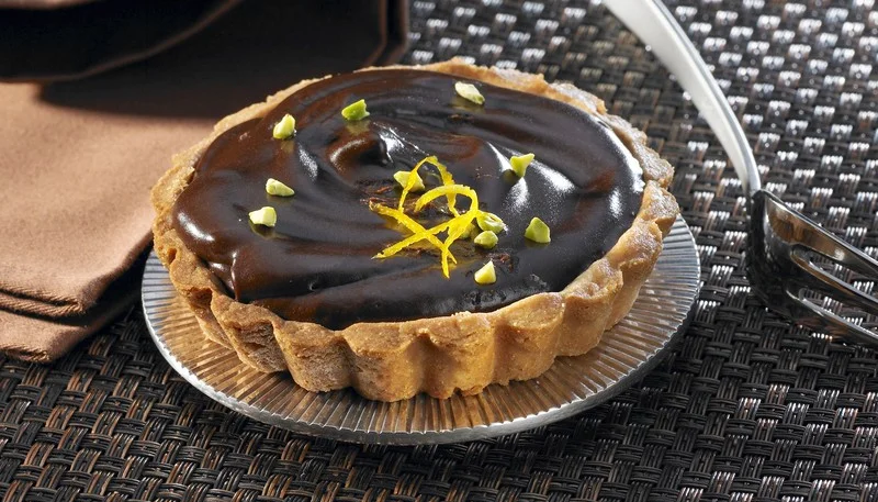 Tartelettes au chocolat noir et éclats de pistaches